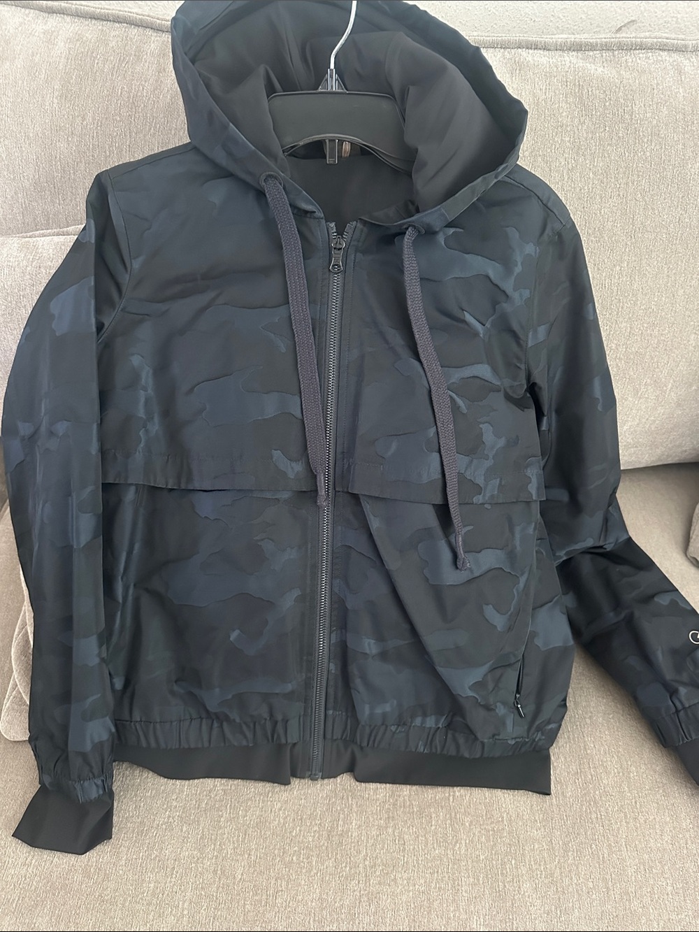 CALIA by Carrie Underwood woman’s  Black Camouflage Hooded Windbreaker